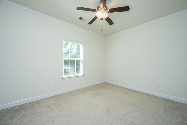 9710 Table Mountain Ln, Ladson, SC 29456 - spare room featuring crown molding, light colored carpet, and ceiling fan