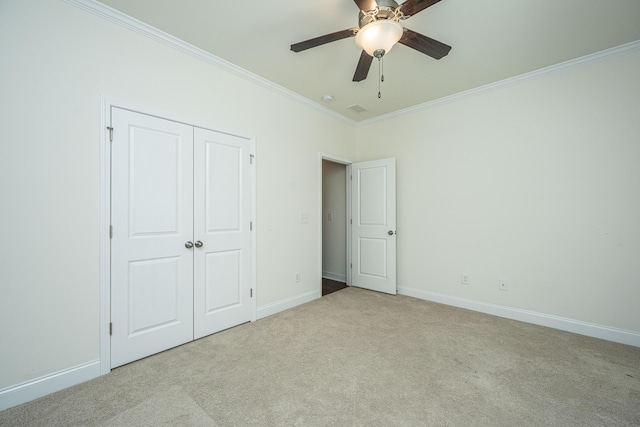 9710 Table Mountain Ln, Ladson, SC 29456 - unfurnished bedroom featuring crown molding, carpet floors, a closet, and a ceiling fan
