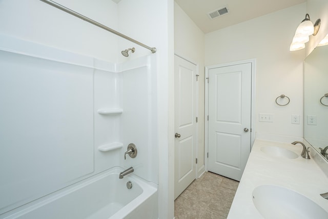 9710 Table Mountain Ln, Ladson, SC 29456 - bathroom featuring shower / washtub combination and double vanity