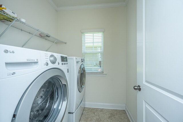 9710 Table Mountain Ln, Ladson, SC 29456 - laundry area featuring washer and dryer and crown molding