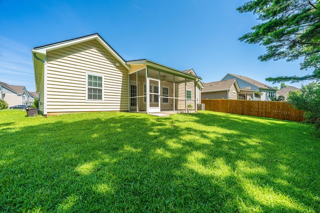9710 Table Mountain Ln, Ladson, SC 29456 - rear view of house featuring a sunroom