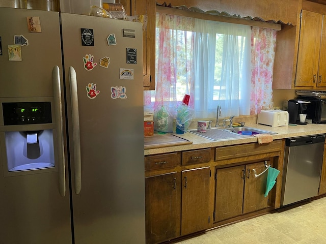 kitchen with sink and stainless steel appliances