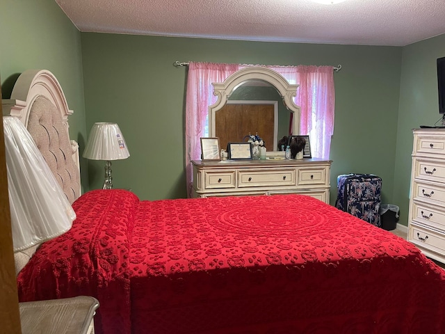 bedroom with a textured ceiling