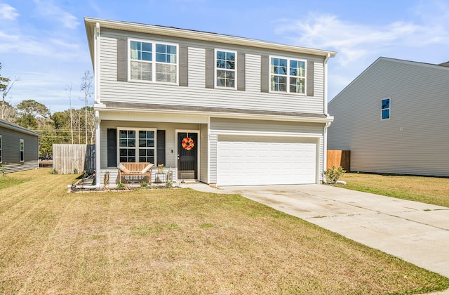 traditional-style home with a front lawn, fence, covered porch, a garage, and driveway