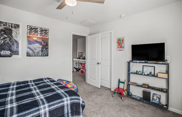 carpeted bedroom featuring ceiling fan