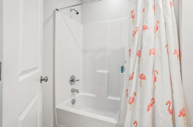 full bathroom featuring shower / bath combination with curtain