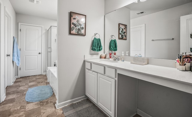 full bathroom featuring visible vents, a stall shower, a tub, baseboards, and vanity