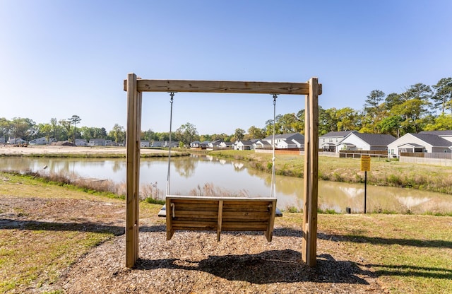 dock area featuring a water view