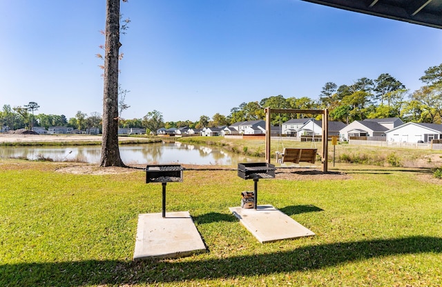 view of yard with a water view