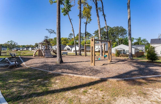 community jungle gym featuring a residential view