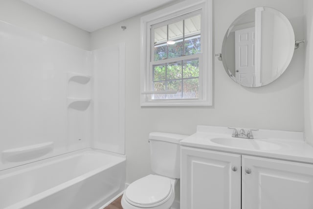 full bathroom with vanity, toilet, and bathtub / shower combination