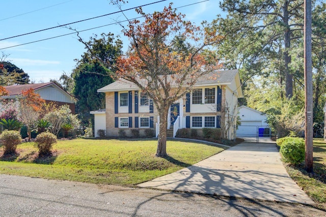 view of front of home with a garage, an outdoor structure, and a front lawn