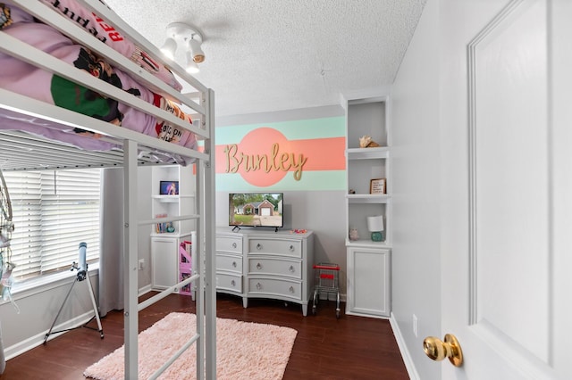 5332 Copley Cir, Summerville, SC 29485 - bedroom featuring wood finished floors, a textured ceiling, and baseboards