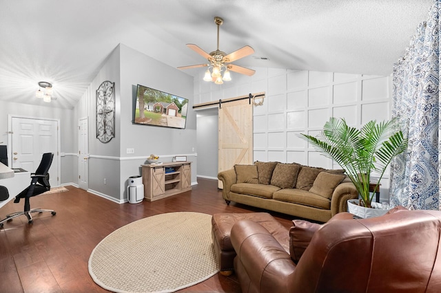 5332 Copley Cir, Summerville, SC 29485 - living area with a barn door, vaulted ceiling, a ceiling fan, wood finished floors, and baseboards