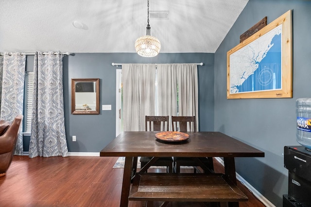 5332 Copley Cir, Summerville, SC 29485 - dining space with wood finished floors, baseboards, vaulted ceiling, and a chandelier