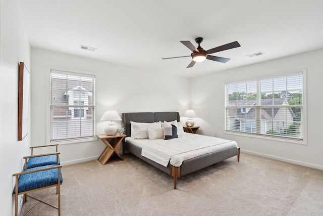 bedroom featuring baseboards, carpet, and a ceiling fan