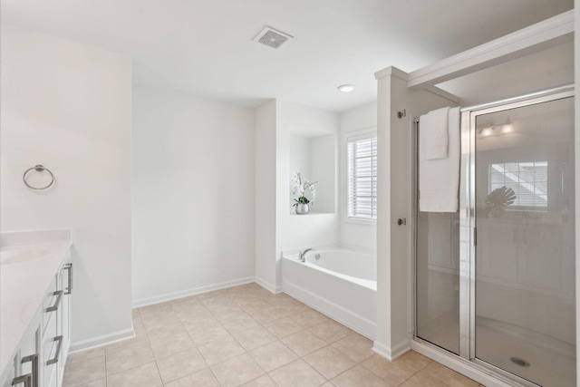 full bathroom featuring baseboards, visible vents, and a stall shower