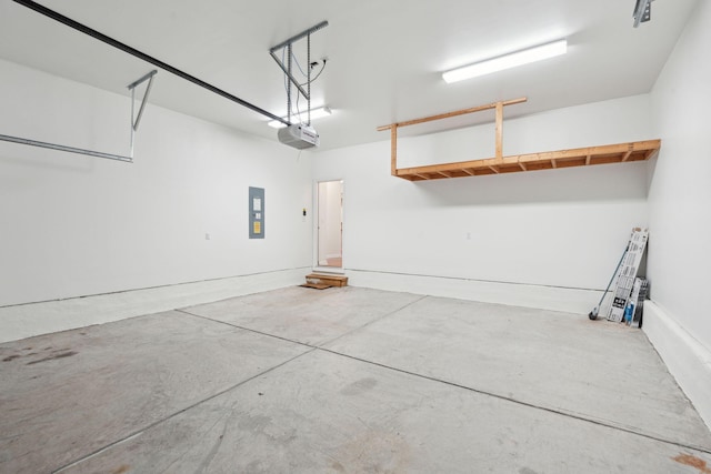 garage with electric panel and a garage door opener