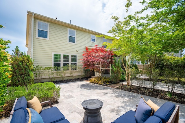 rear view of property with a patio