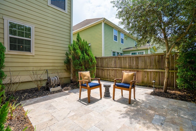 view of patio with fence