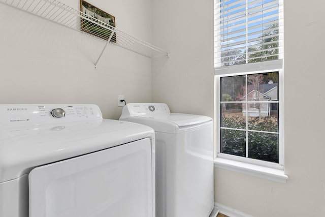 laundry room featuring washer and clothes dryer