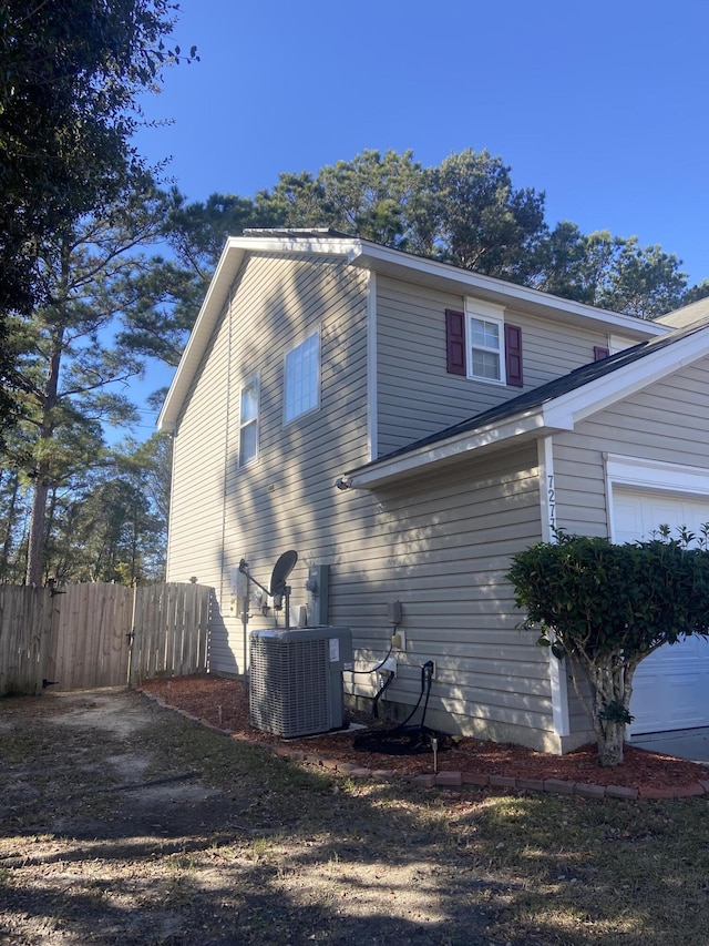 view of home's exterior with cooling unit