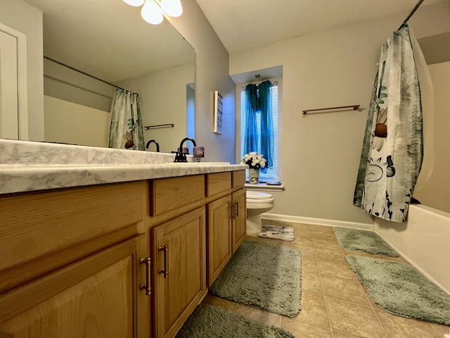 full bathroom featuring tile patterned floors, shower / bathtub combination with curtain, vanity, and toilet