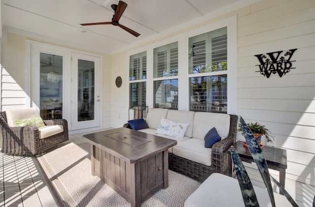 view of patio with an outdoor hangout area and a ceiling fan