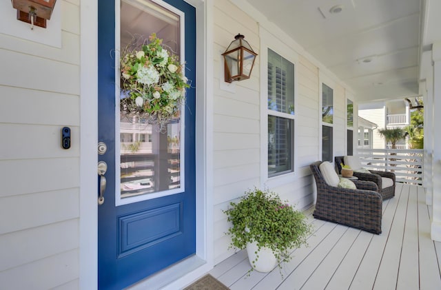 property entrance with covered porch