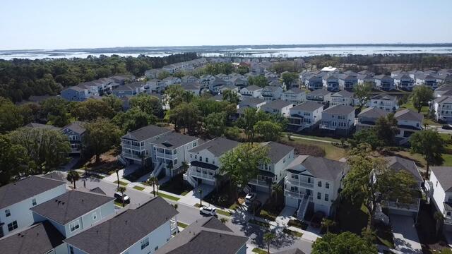 bird's eye view with a water view and a residential view
