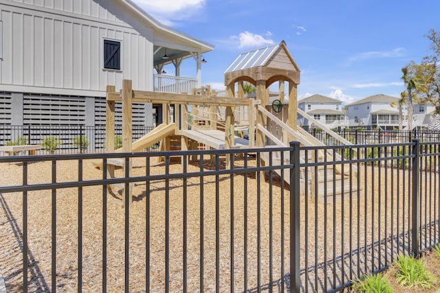 exterior space featuring a residential view and a fenced backyard