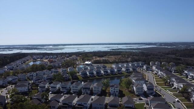 aerial view with a water view and a residential view