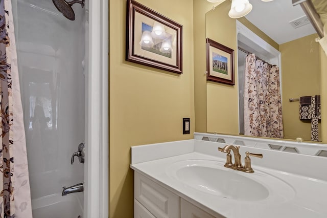 bathroom with vanity and shower / tub combo