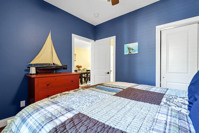 bedroom featuring a closet and ceiling fan