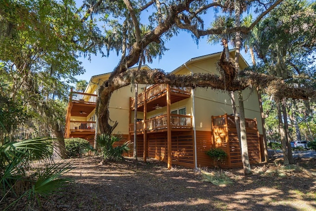 rear view of property with a deck