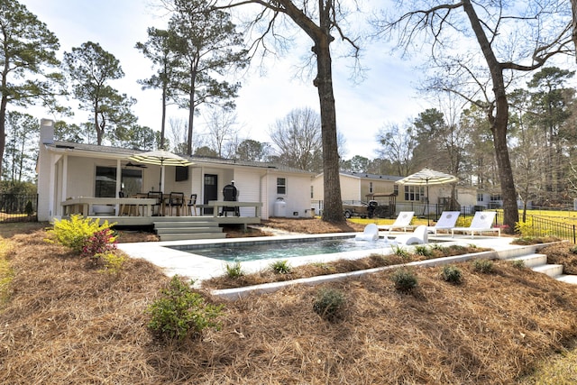 1762 James Loop Rd, Manning, SC 29102 - rear view of property featuring a wooden deck and a chimney