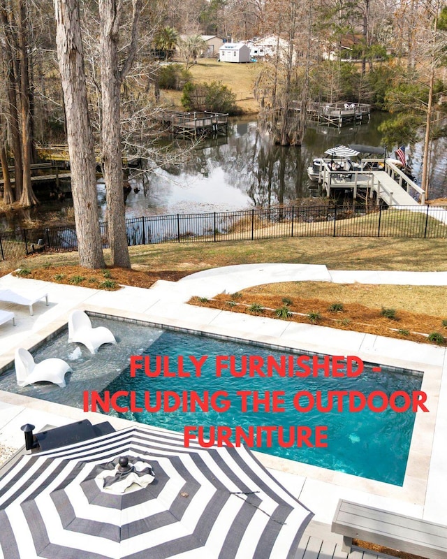 1762 James Loop Rd, Manning, SC 29102 - view of swimming pool featuring a water view