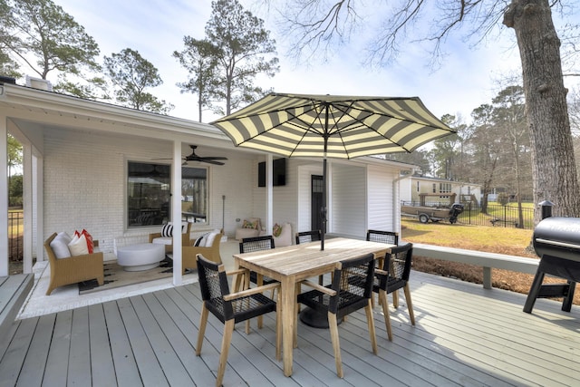 1762 James Loop Rd, Manning, SC 29102 - wooden terrace with outdoor dining space and ceiling fan