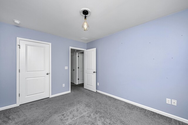 431 Buckhannon Ln, Moncks Corner, SC 29461 - unfurnished bedroom featuring baseboards and carpet flooring