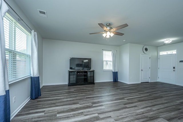 431 Buckhannon Ln, Moncks Corner, SC 29461 - unfurnished living room featuring wood finished floors and ceiling fan