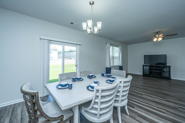 431 Buckhannon Ln, Moncks Corner, SC 29461 - dining space with healthy amount of natural light, dark wood-type flooring, a chandelier, and ceiling fan