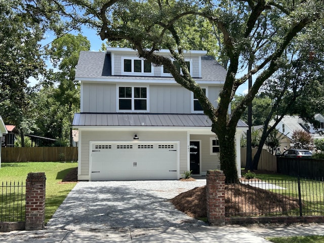 641 Magnolia Rd, Charleston, SC 29407 - view of front facade with driveway, a standing seam roof, a shingled roof, a metal roof, and an attached garage