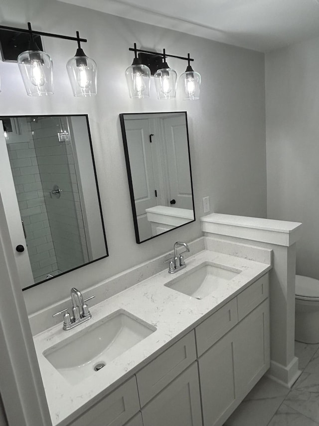 641 Magnolia Rd, Charleston, SC 29407 - bathroom with double vanity, marble look tile flooring, and a tile shower