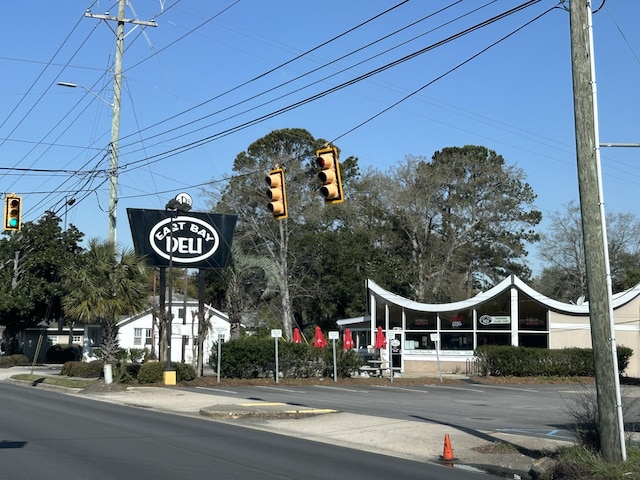 641 Magnolia Rd, Charleston, SC 29407 - view of asphalt street with traffic lights, traffic signs, and sidewalks