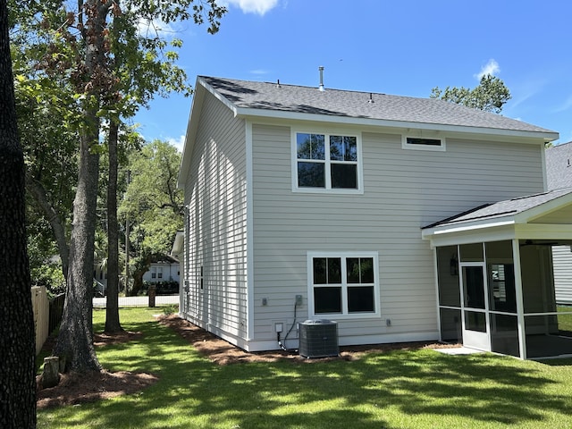 641 Magnolia Rd, Charleston, SC 29407 - back of house with a sunroom, a yard, and roof with shingles