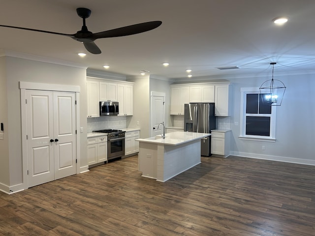 641 Magnolia Rd, Charleston, SC 29407 - kitchen with appliances with stainless steel finishes, crown molding, ceiling fan, light countertops, and backsplash