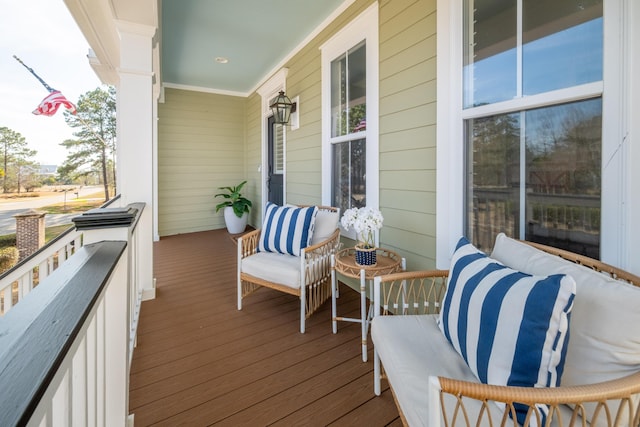 wooden deck featuring covered porch