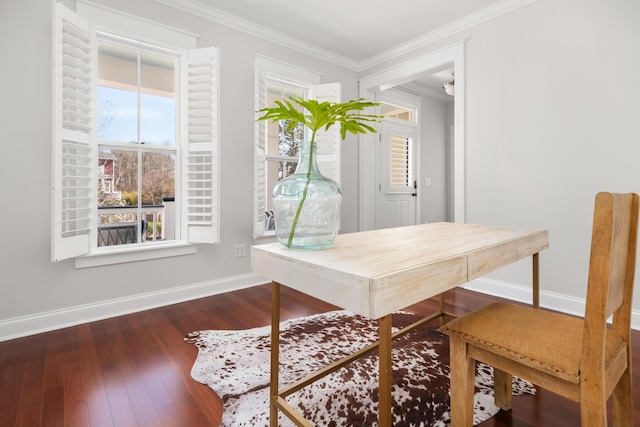 office space featuring crown molding, baseboards, and wood-type flooring