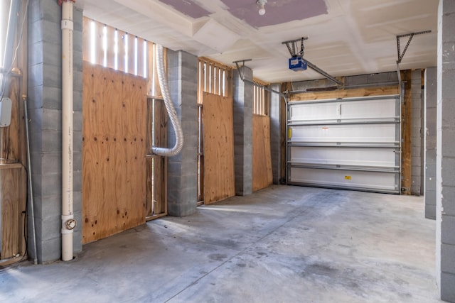 garage featuring a garage door opener