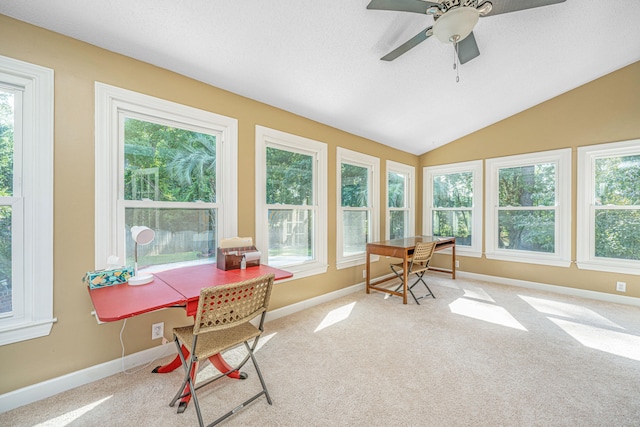 sunroom featuring ceiling fan, plenty of natural light, and vaulted ceiling